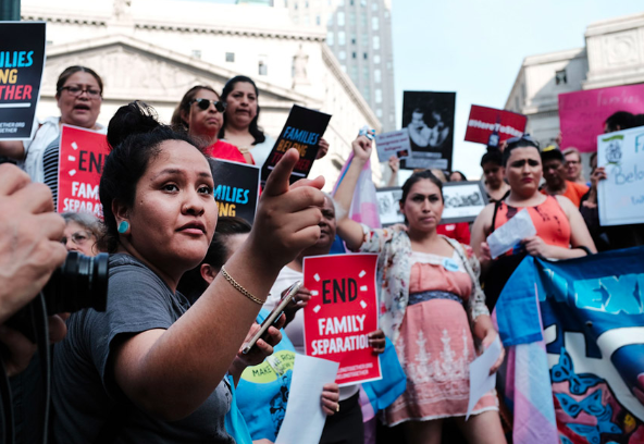 Hundreds of immigrant rights activists participate in a rally at the Federal Building in lower Manhattan on June 1, 2018 in protest of the Trump administration's "zero tolerance" immigration policy. (Image credit: In These Times Magazine)